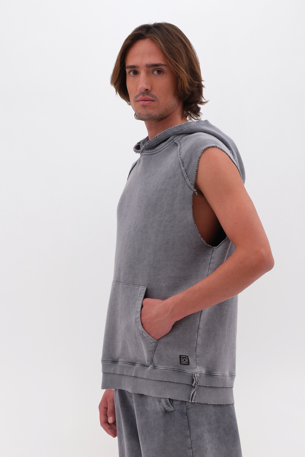 SLEEVELESS HOODIE WITH RAW EDGES