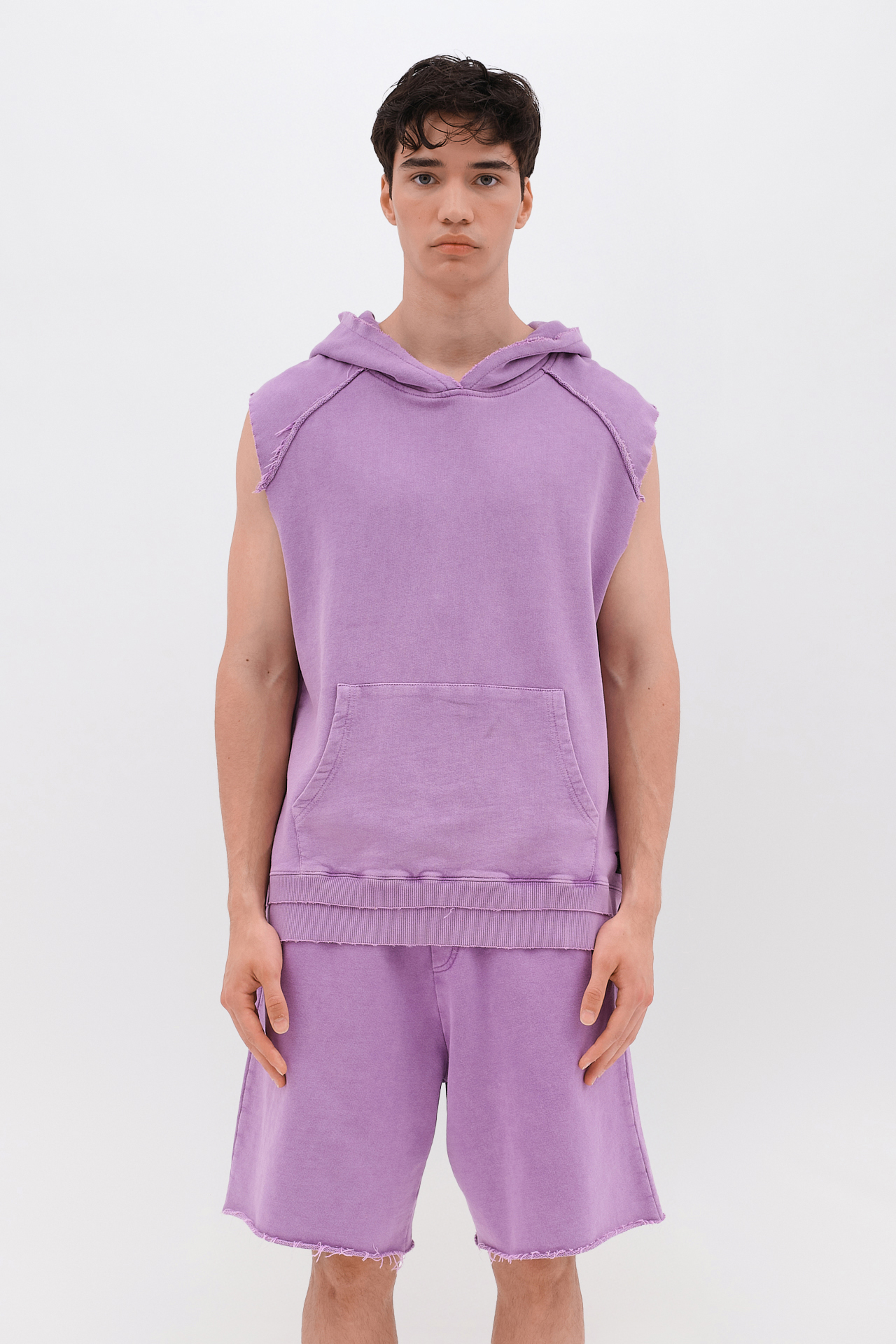 SLEEVELESS HOODIE WITH RAW EDGES