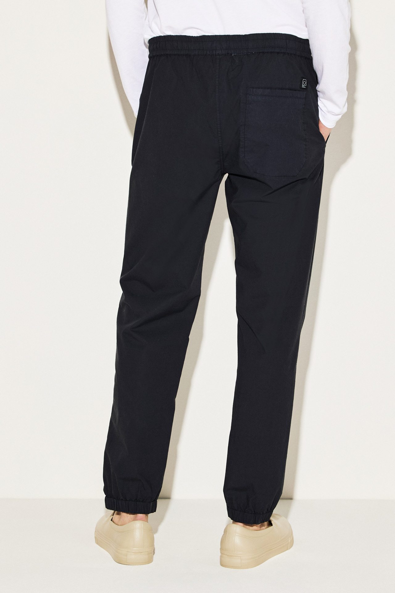 RELAXED FIT CUFFED TROUSERS
