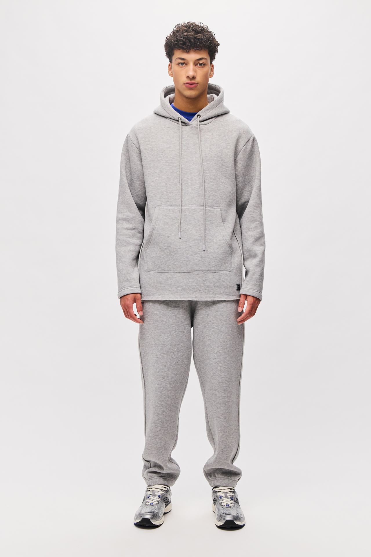 LOOSE SWEATPANTS WITH RAW EDGE DETAIL