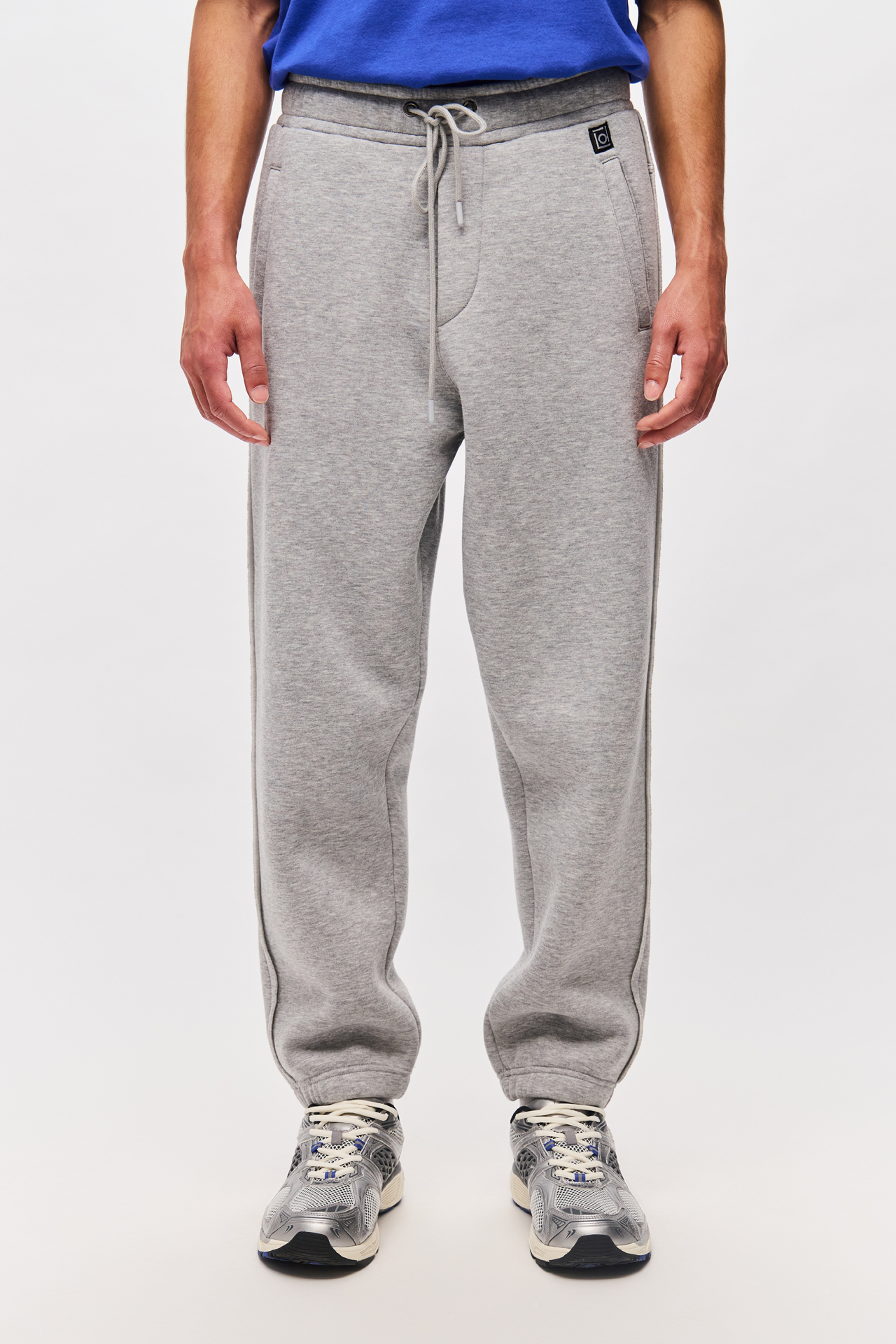 LOOSE SWEATPANTS WITH RAW EDGE DETAIL