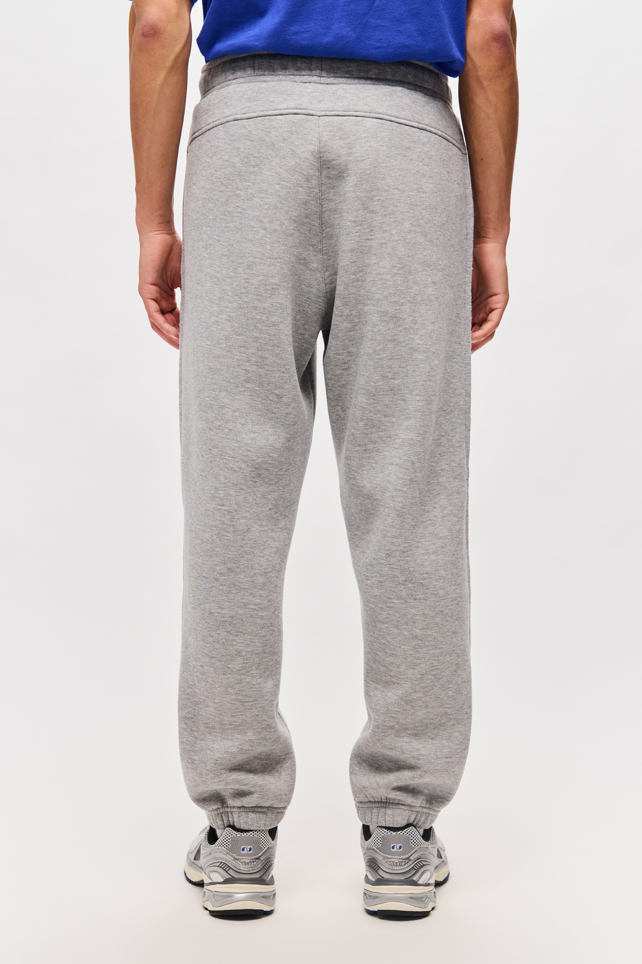 LOOSE SWEATPANTS WITH RAW EDGE DETAIL
