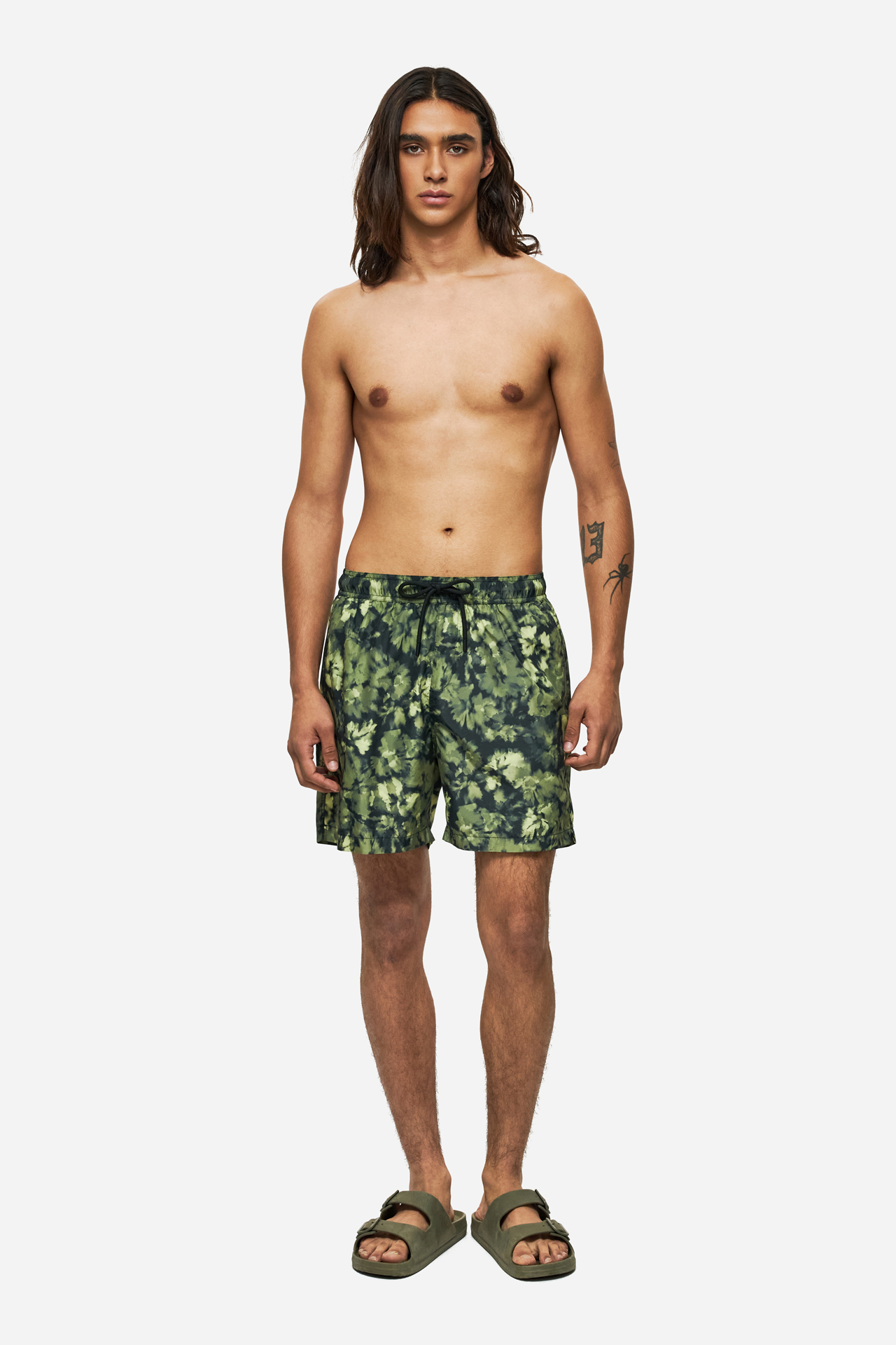 THE CAMOUFLAGE SWIM TRUNKS