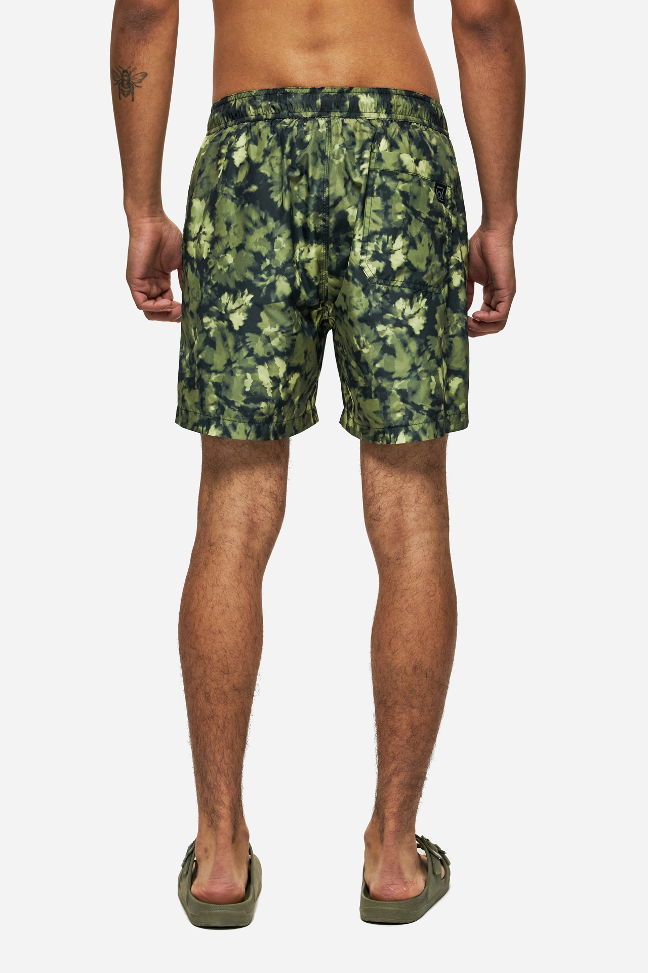 THE CAMOUFLAGE SWIM TRUNKS
