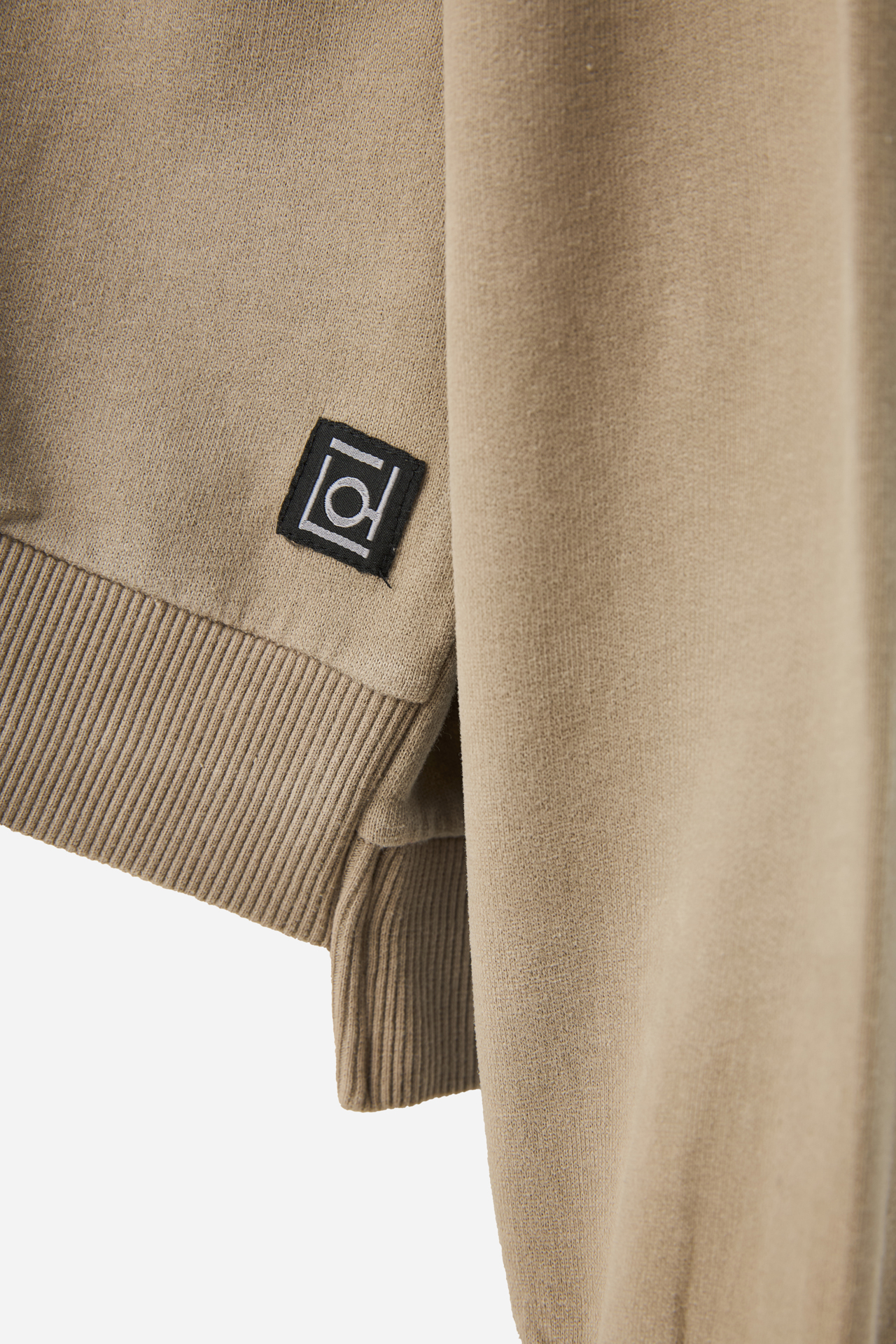 OVERSIZED ASSYMETRIC CREWNECK