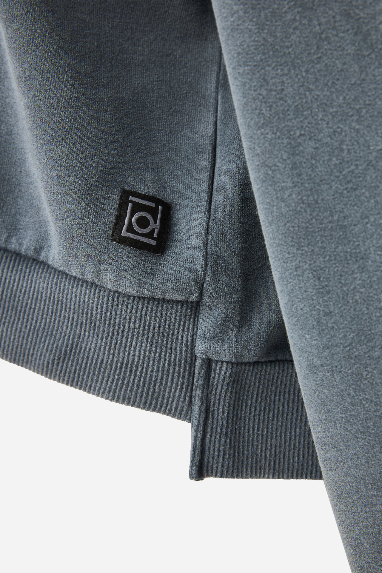 OVERSIZED ASSYMETRIC CREWNECK