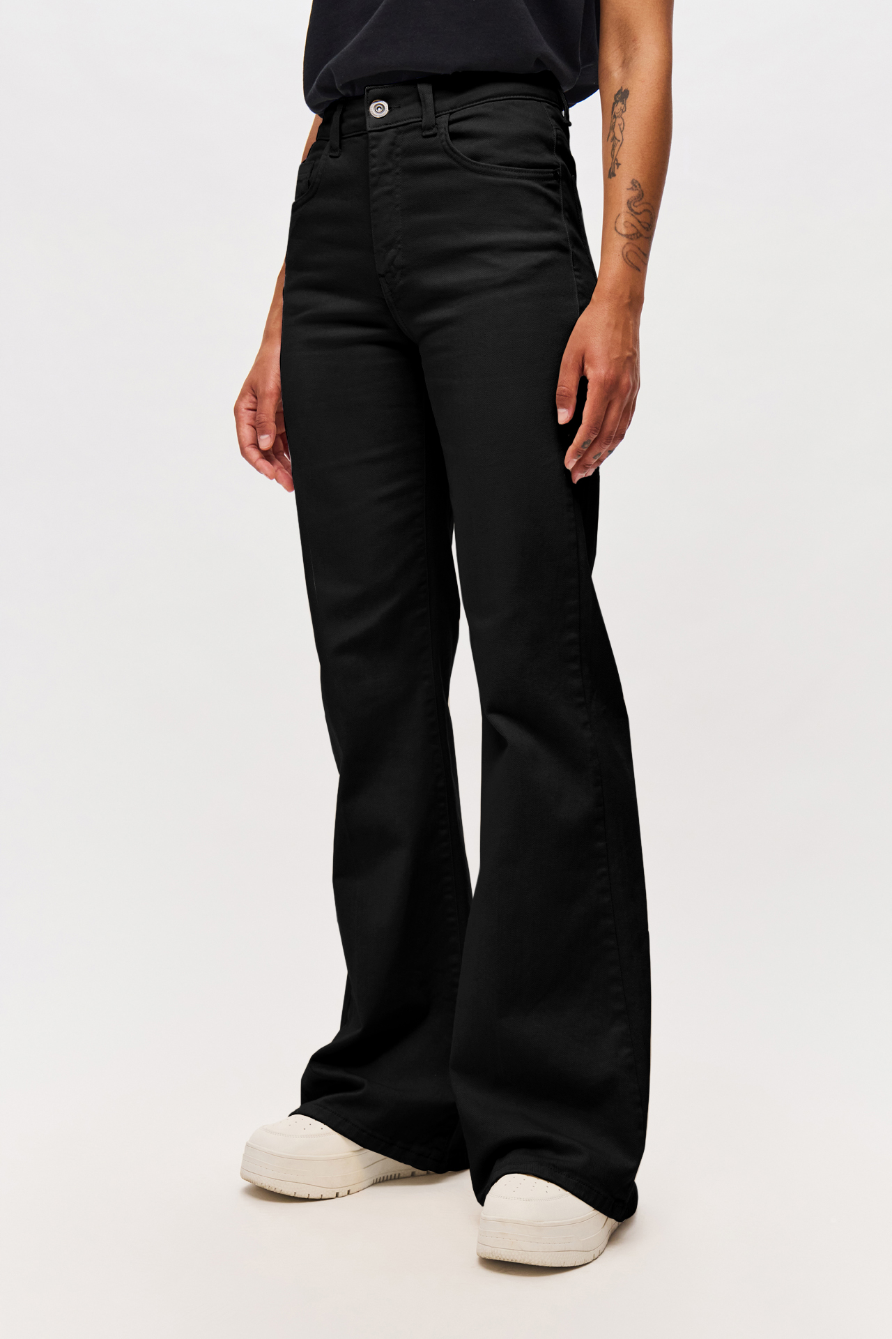MID-RISE SKINNY FLARE TROUSERS