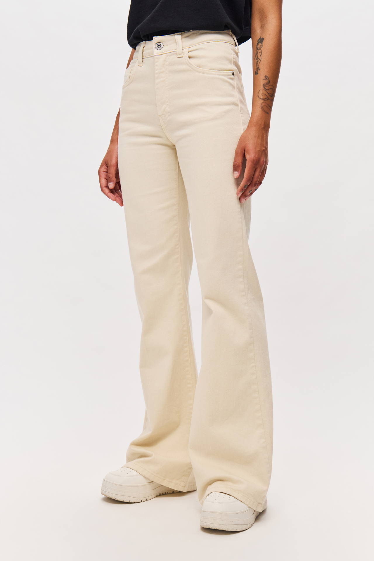 MID-RISE SKINNY FLARE TROUSERS